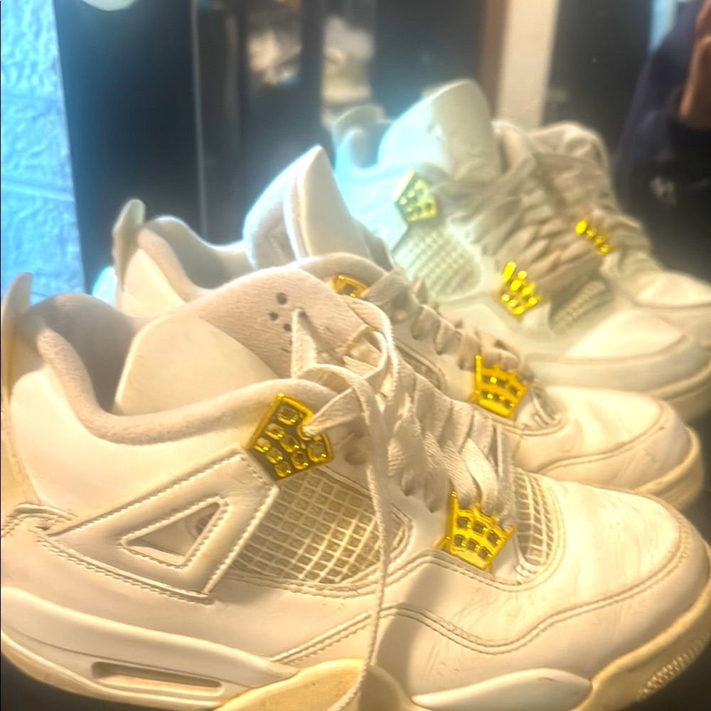 Women’s jordan 4s “metallic gold”